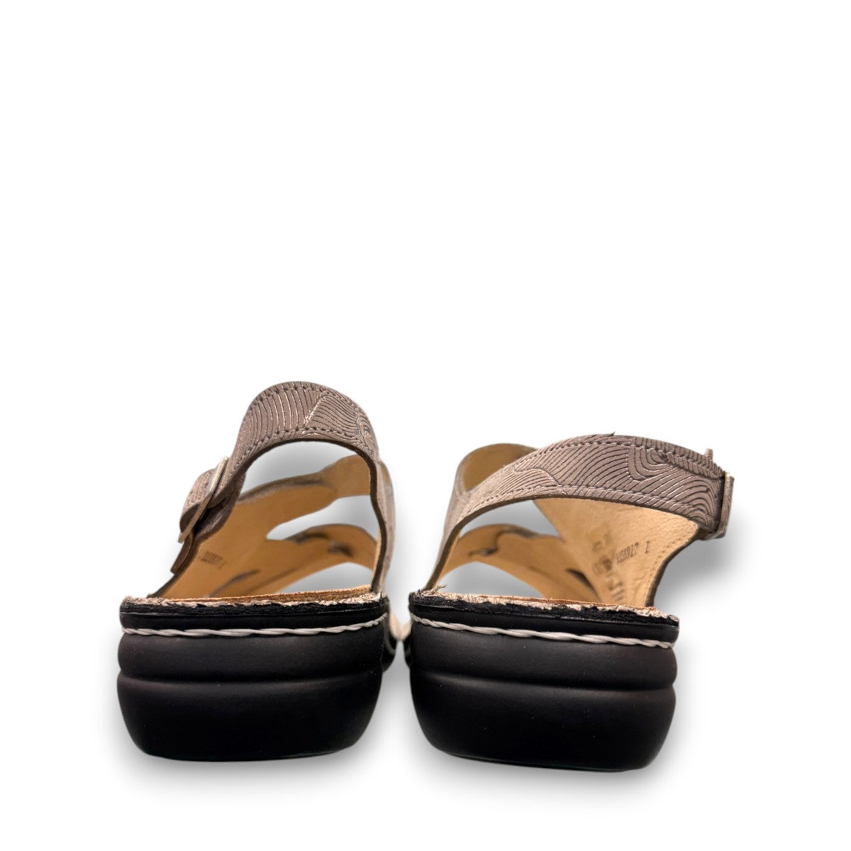 Finn Comfort Gomera sandal in storm sand leather with adjustable straps and cork footbed.
photo of the back side