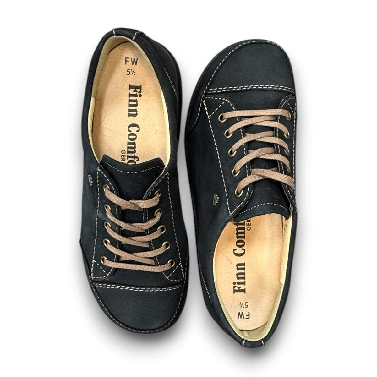 Finn Comfort Ikebukuro black suede sneaker with curved Finnamic outsole and contrast stitching.
photo of the top side