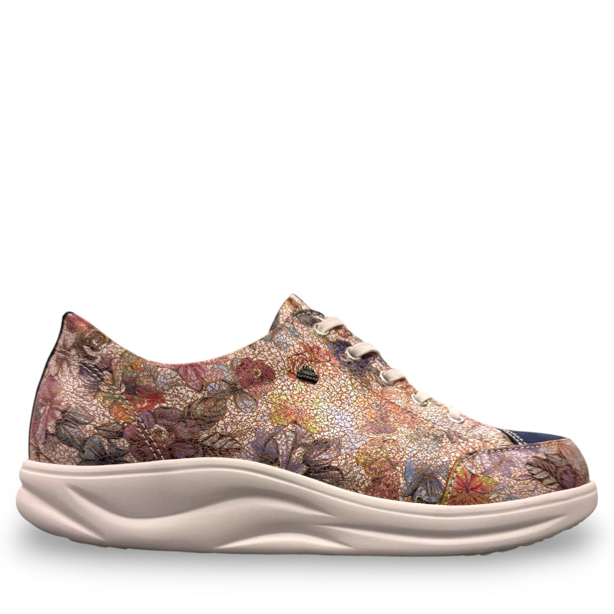 Finn Comfort Ikebukuro sneaker in multi-colored floral nubuck leather with a curved Finnamic outsole.
photo of the right side