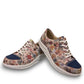 Finn Comfort Ikebukuro sneaker in multi-colored floral nubuck leather with a curved Finnamic outsole.
photo of the front side