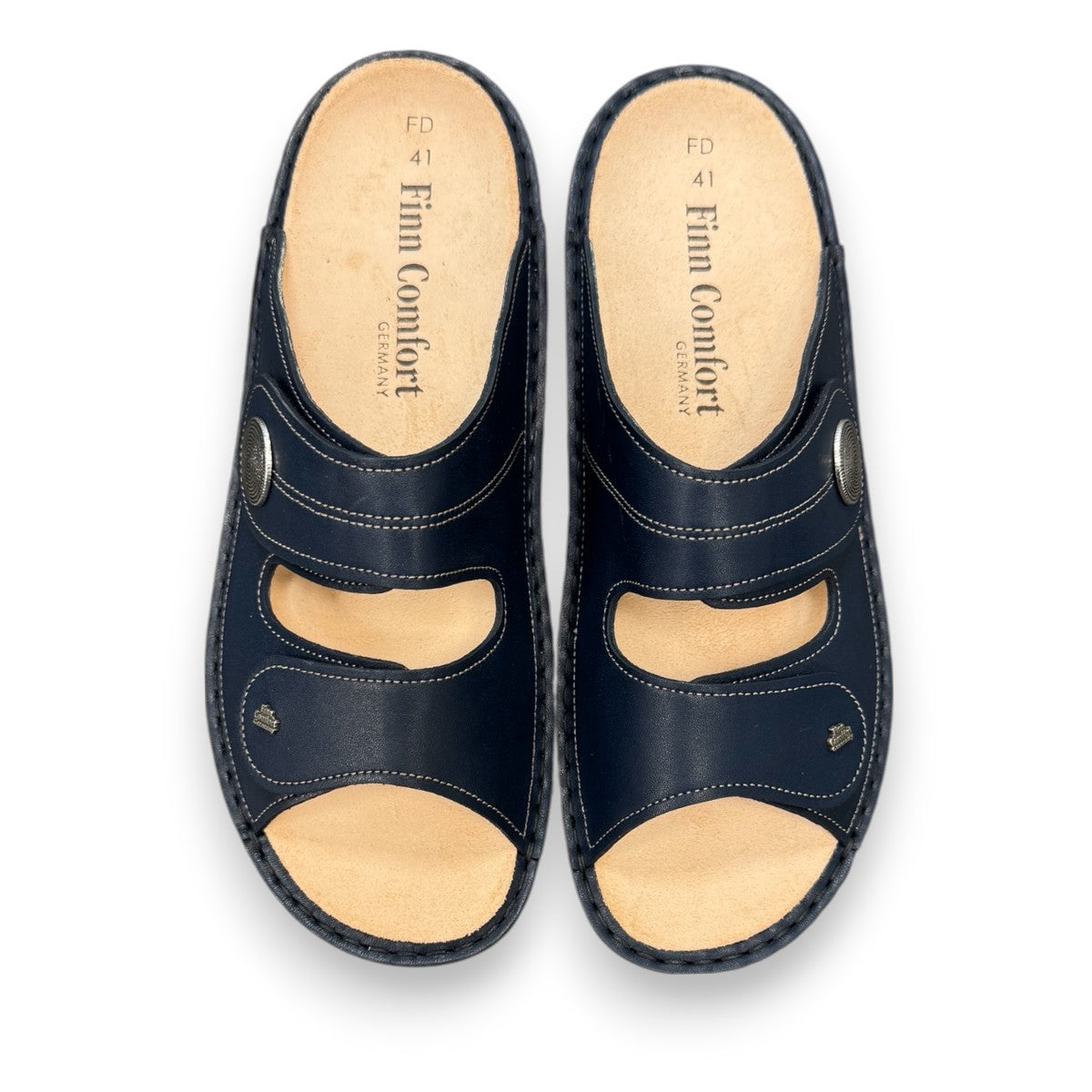Finn Comfort Sansibar blue leather sandal with two adjustable hook and loop straps and cork footbed.
photo of the top side