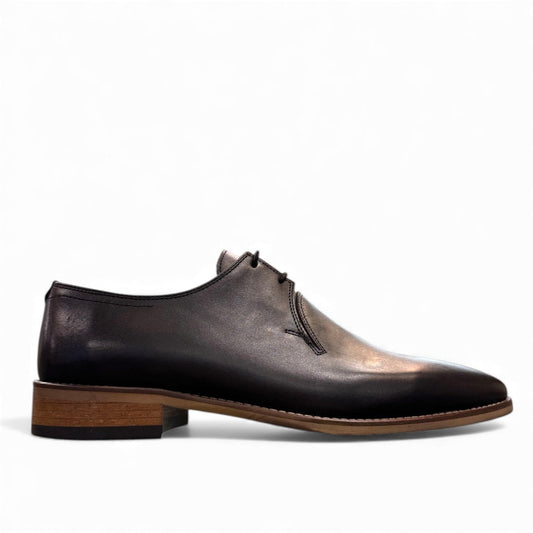 FIT MILAN black genuine leather lace-up dress shoe with a durable rubber outsole, side profile view.