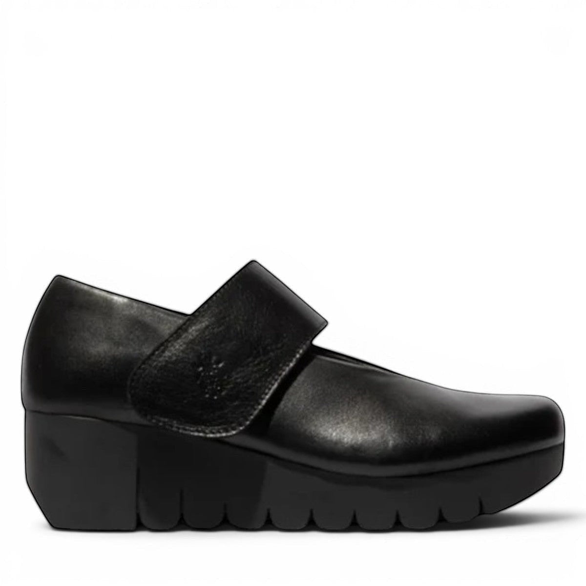 FLY LONDON Vari188Fly burn black leather wedge shoes with velcro strap and rubber sole.
photo of the right side