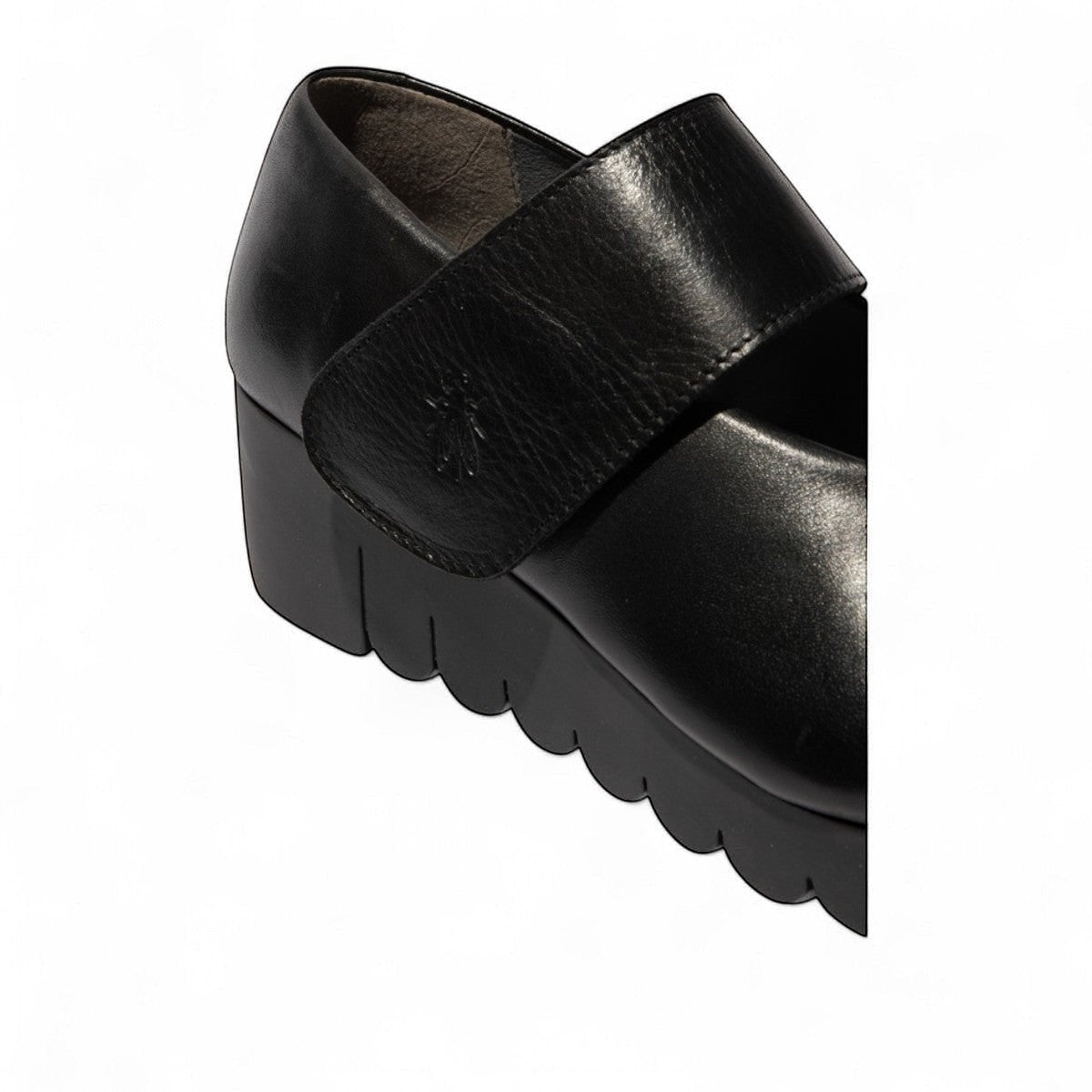 FLY LONDON Vari188Fly burn black leather wedge shoes with velcro strap and rubber sole.
photo of the back side