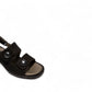 black leather slingback sandals with glossy stud details and a comfortable block heel.