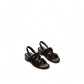 black leather slingback sandals with glossy stud details and a comfortable block heel.