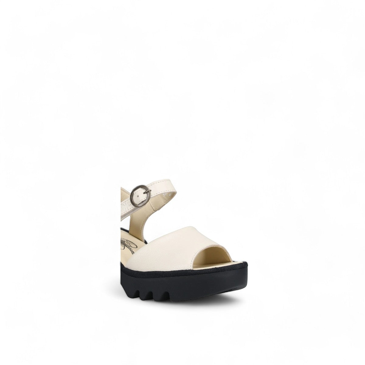 Fly London off-white leather sandals with a chunky black rubber platform sole and ankle strap.