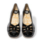 Fly London Yubi480fly- nappalak black patent leather wedge shoe with cut-out details and a translucent rubber sole.