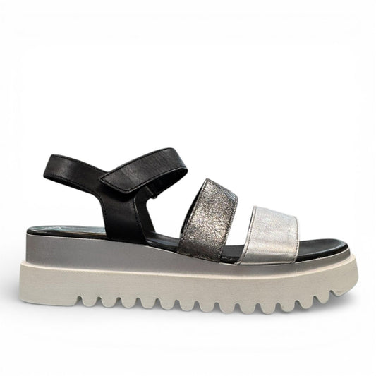 Gabor leather wedge sandals in black and silver with three straps and a sawtooth EVA platform sole. Photo of right side view.