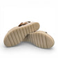 Gabor wedge sandal in metallic gold and suede puder with a decorative buckle and velcro strap. Photo of bottom view.