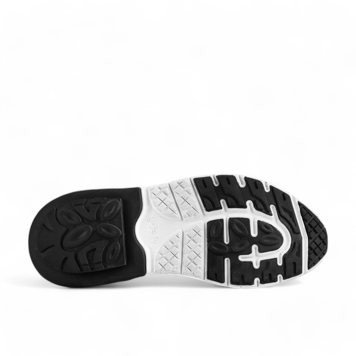 grey GDEFY Mighty Walk athletic shoe with breathable mesh, VersoShock technology, and speckled sole.
photo of the bottom side