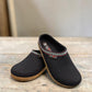 Haflinger GZ black wool felt clog with decorative trim and anatomically contoured cork midsole. Photo of front side view.