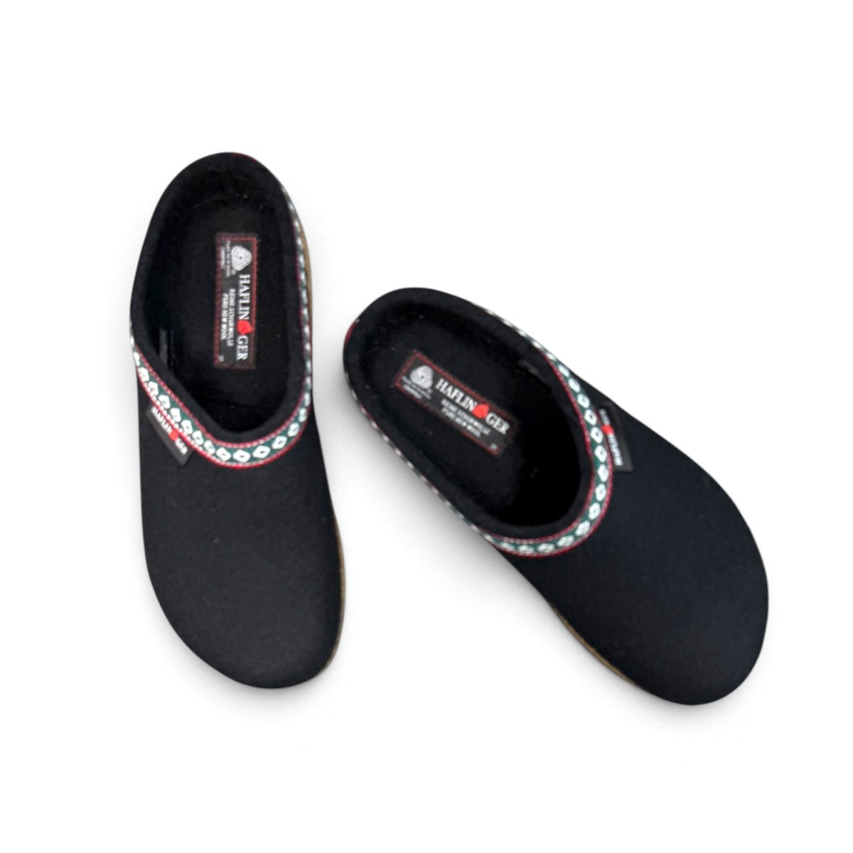 Haflinger GZ black wool felt clog with decorative trim and anatomically contoured cork midsole. Photo of upper view 2.