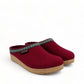 Haflinger GZ burgundy wool felt clogs with cork midsole and decorative trim. Photo of front side view 1.