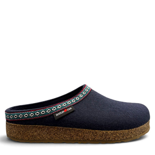 Haflinger GZ navy wool felt clog with decorative trim and cork midsole. Photo of right side view.