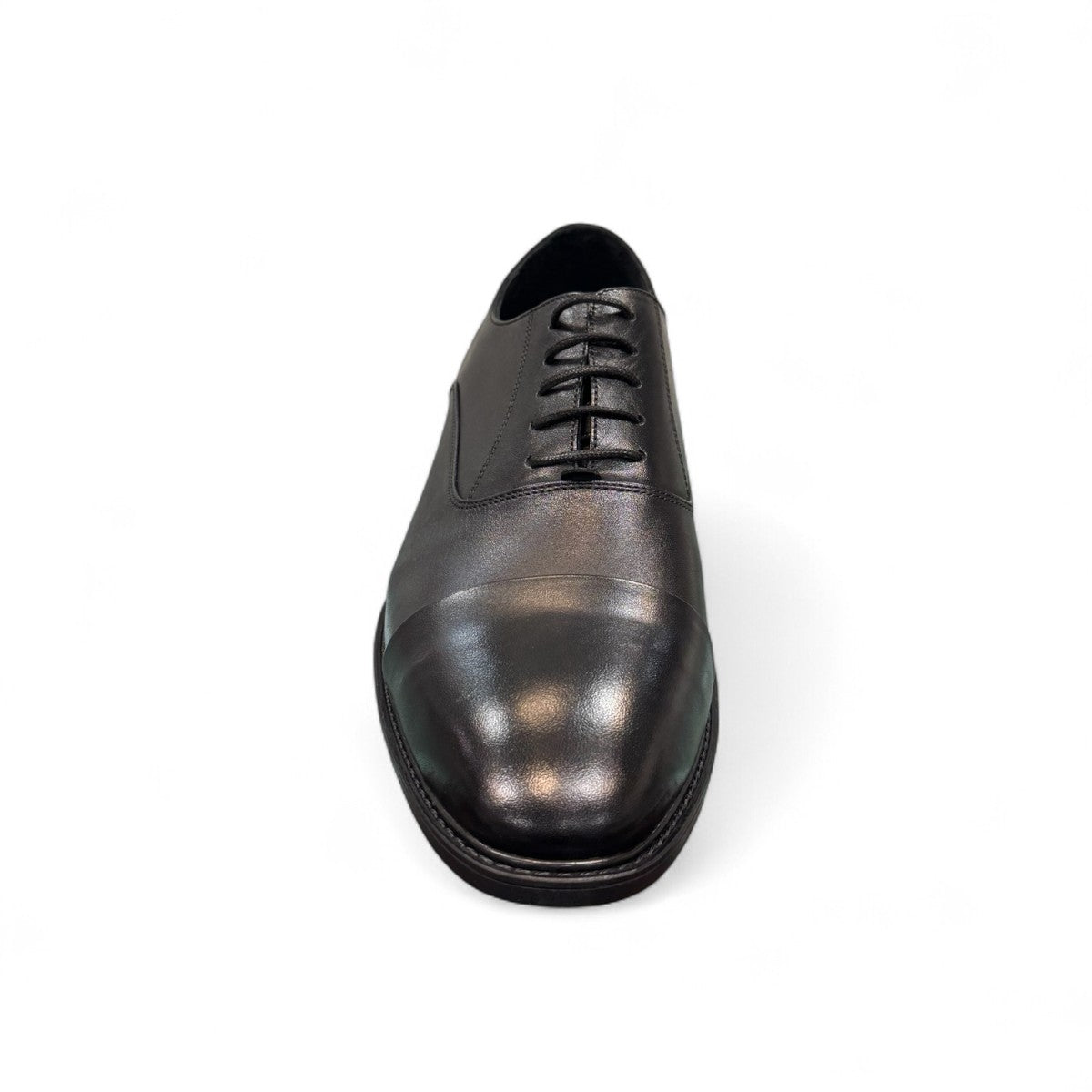 Horn Shoes Arjhand black leather oxford shoes with a classic cap toe design and lace-up closure. Photo of front view 2.