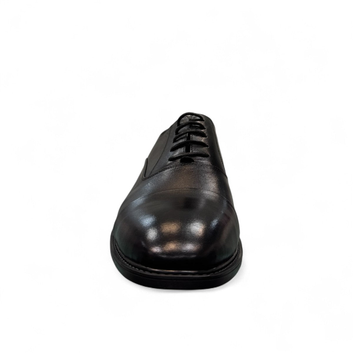 Horn Shoes Arjhand black leather oxford shoes with a classic cap toe design and lace-up closure. Photo of front view 1.