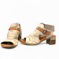 JO&COCO Betty beige leather dress sandal with block heel, side buckle, and rear zip closure. Photo of front side view 1.