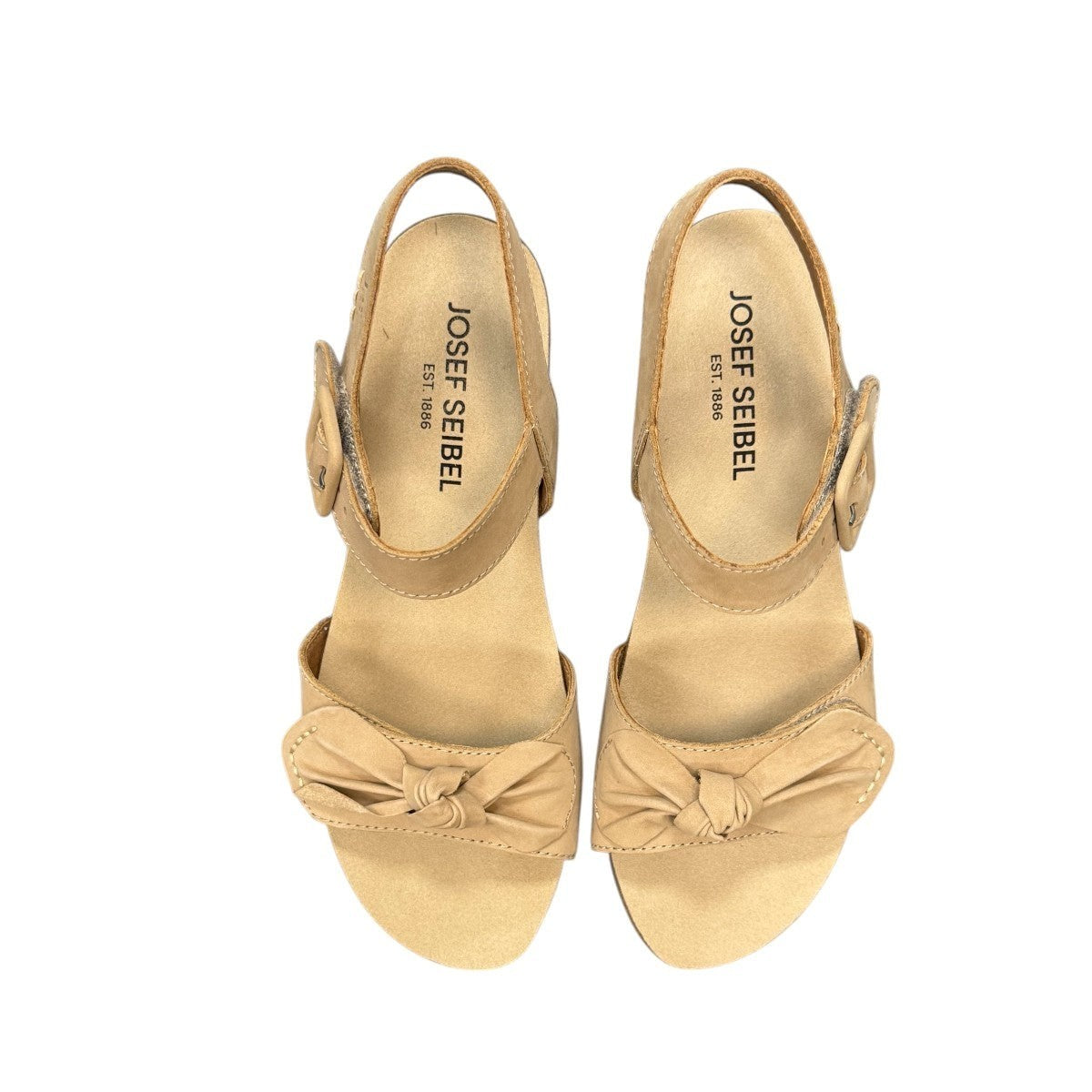 Josef Seibel Grace 11 beige leather sandal with a bow detail, adjustable strap, and cork block heel.
photo of the top.