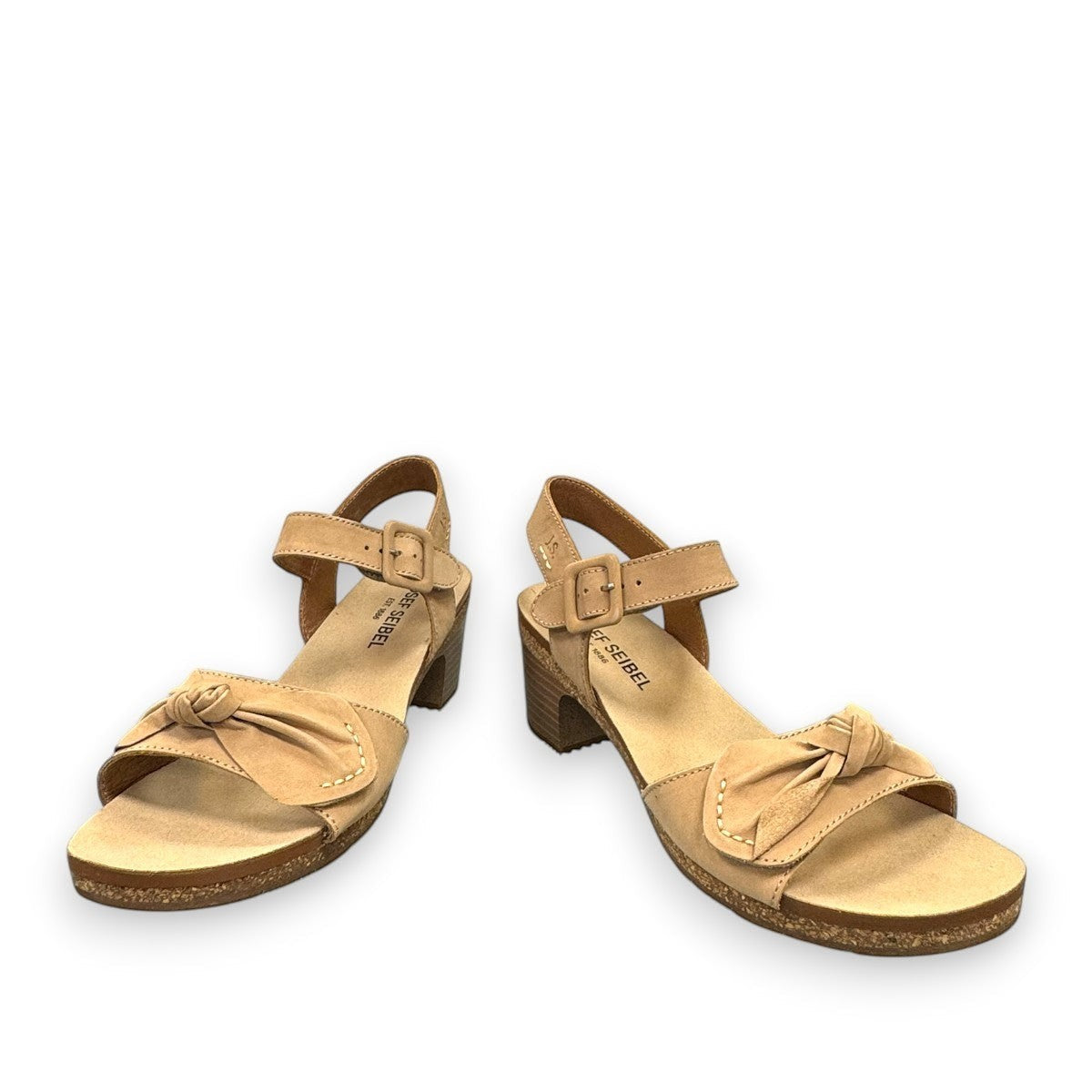 Josef Seibel Grace 11 beige leather sandal with a bow detail, adjustable strap, and cork block heel.
photo of the front.