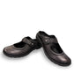 Josef Seibel Charlotte 04 black leather slip-on shoe with a comfortable rubber sole and strap detail. photo of the front.