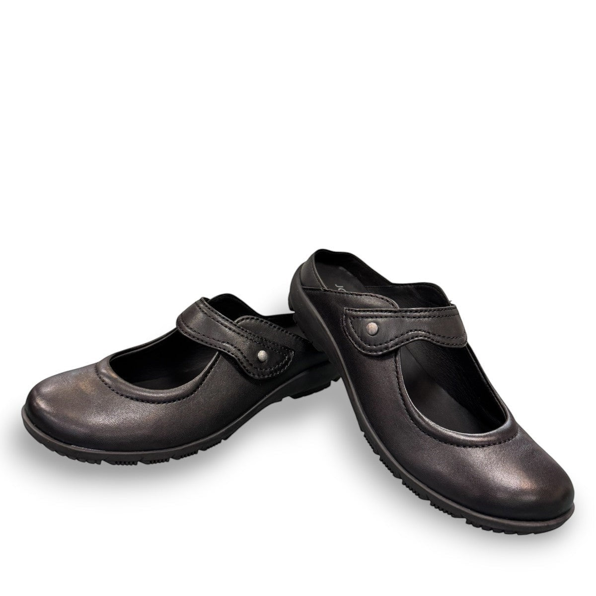 Josef Seibel Charlotte 04 black leather slip-on shoe with a comfortable rubber sole and strap detail. photo of the front.