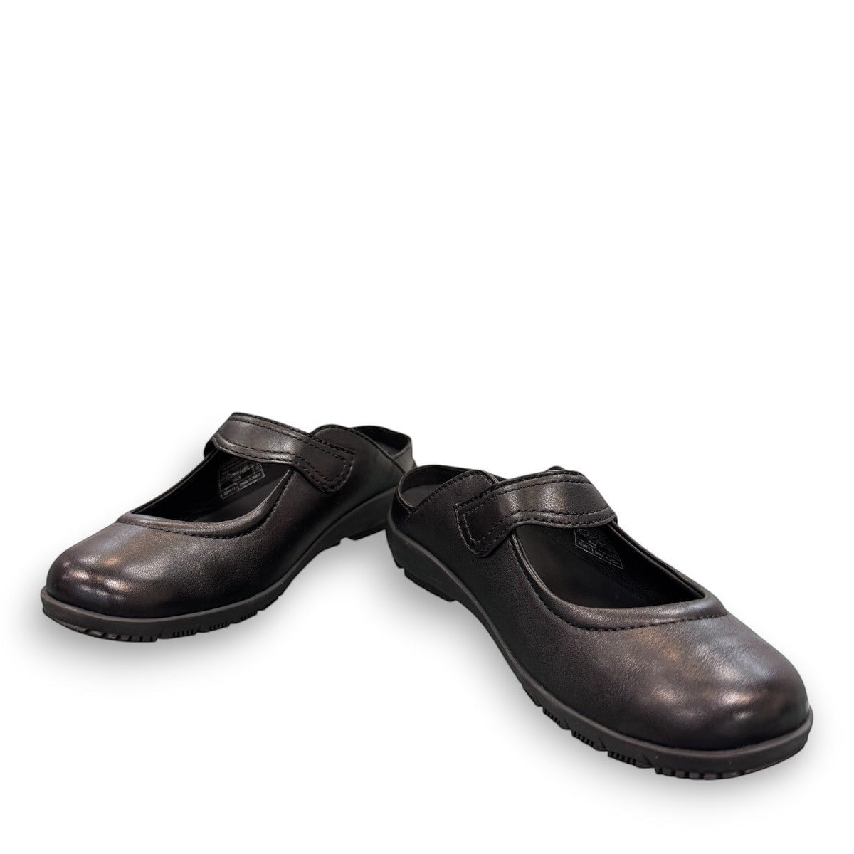 Josef Seibel Charlotte 04 black leather slip-on shoe with a comfortable rubber sole and strap detail. photo of the front.