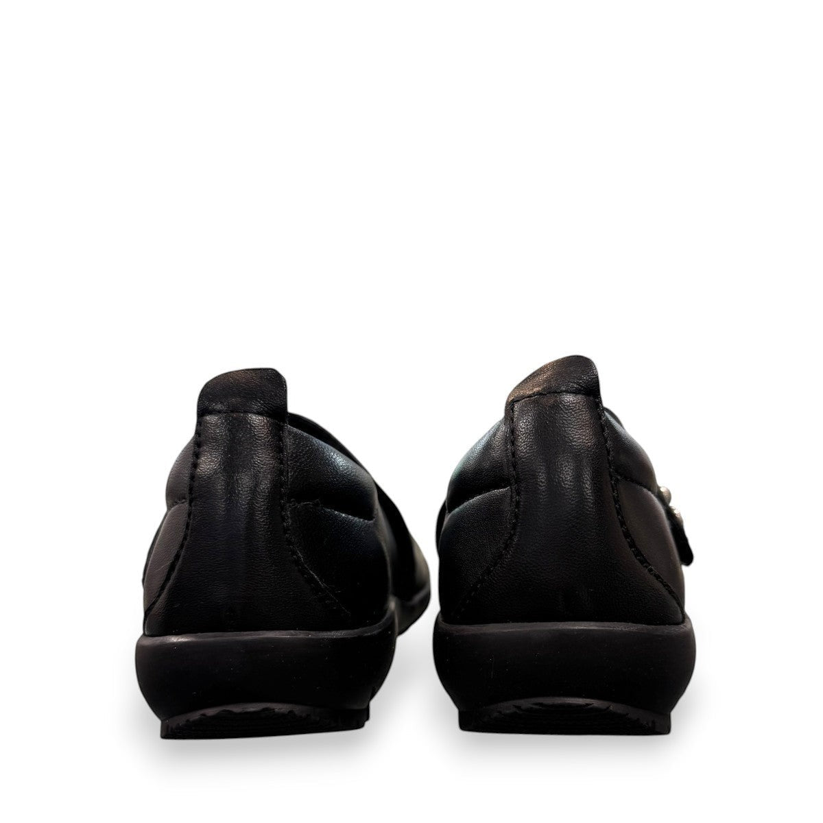 Josef Seibel Charlotte 03 black leather mary jane shoe with a side strap and durable rubber sole. photo of the back.
