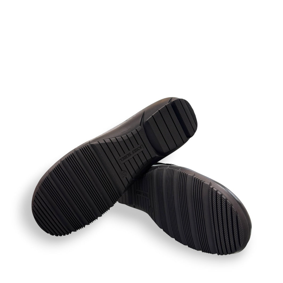 Josef Seibel Charlotte 03 black leather mary jane shoe with a side strap and durable rubber sole. photo of the bottom.