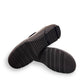 Josef Seibel Charlotte 04 black leather slip-on shoe with a comfortable rubber sole and strap detail. photo of the bottom.