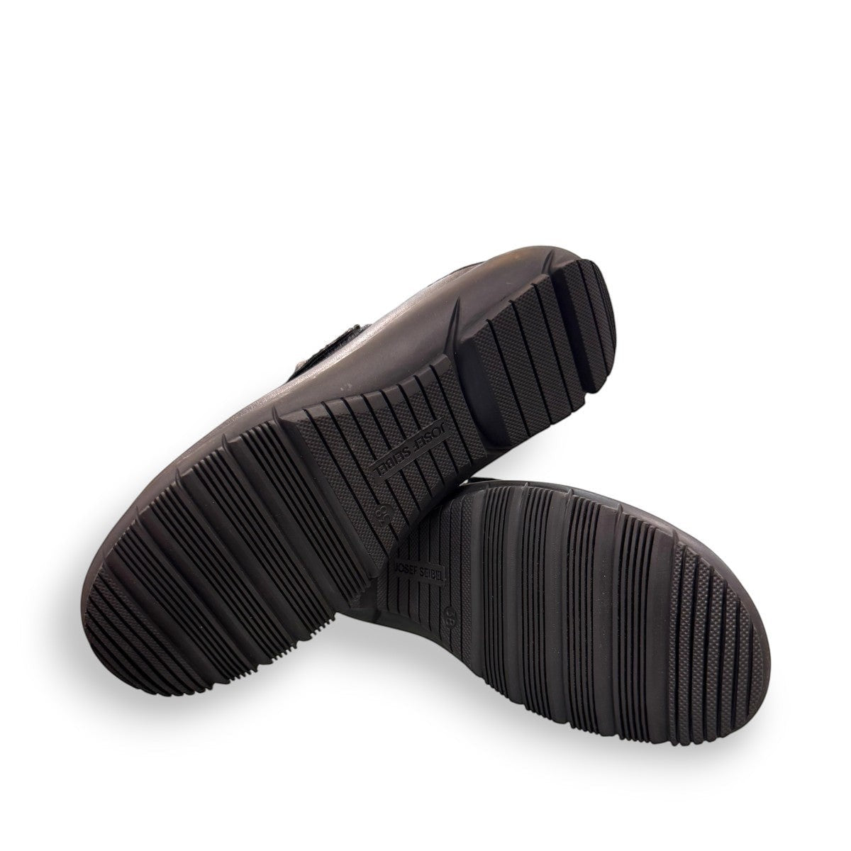 Josef Seibel Charlotte 04 black leather slip-on shoe with a comfortable rubber sole and strap detail. photo of the bottom.