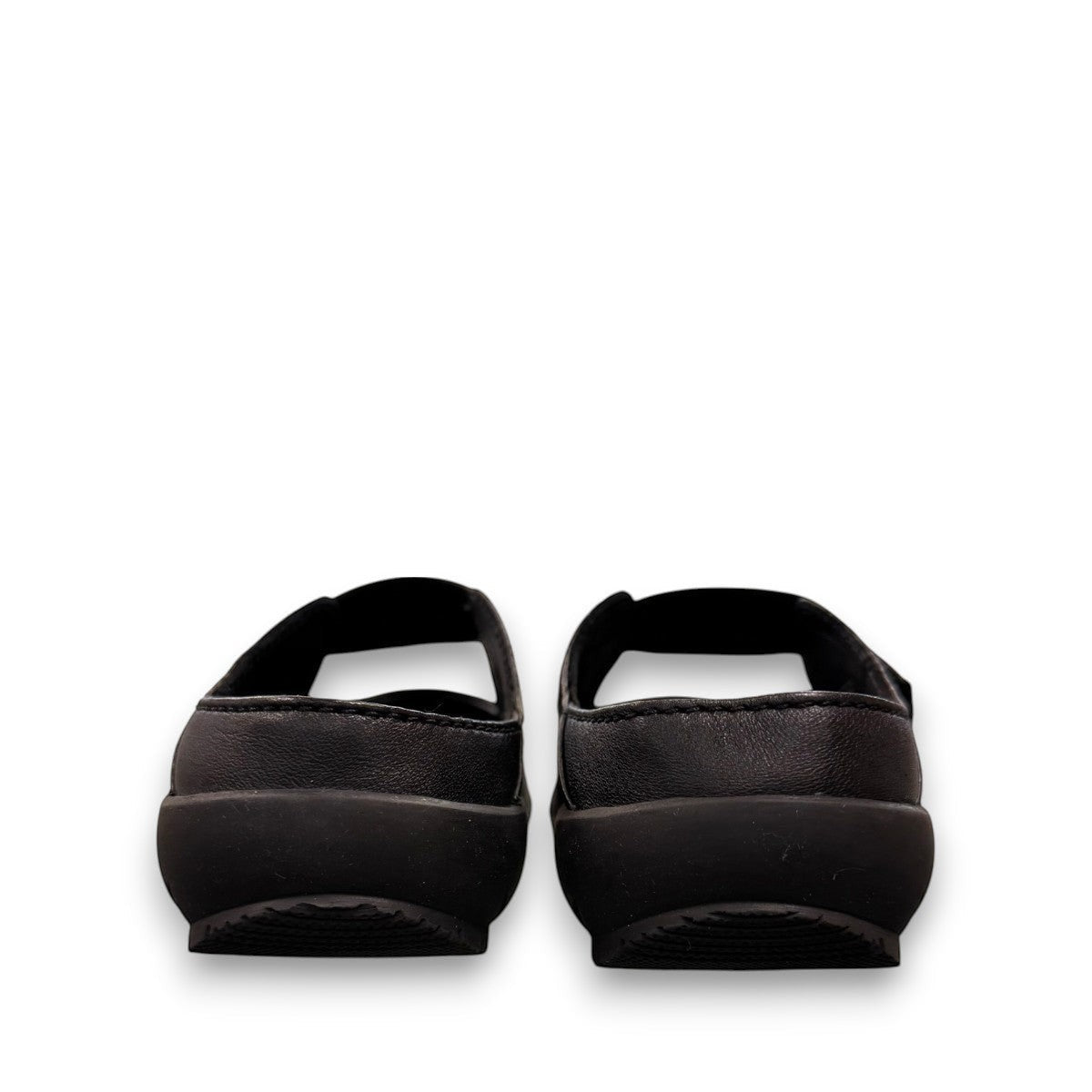 Josef Seibel Charlotte 04 black leather slip-on shoe with a comfortable rubber sole and strap detail. photo of the back.
