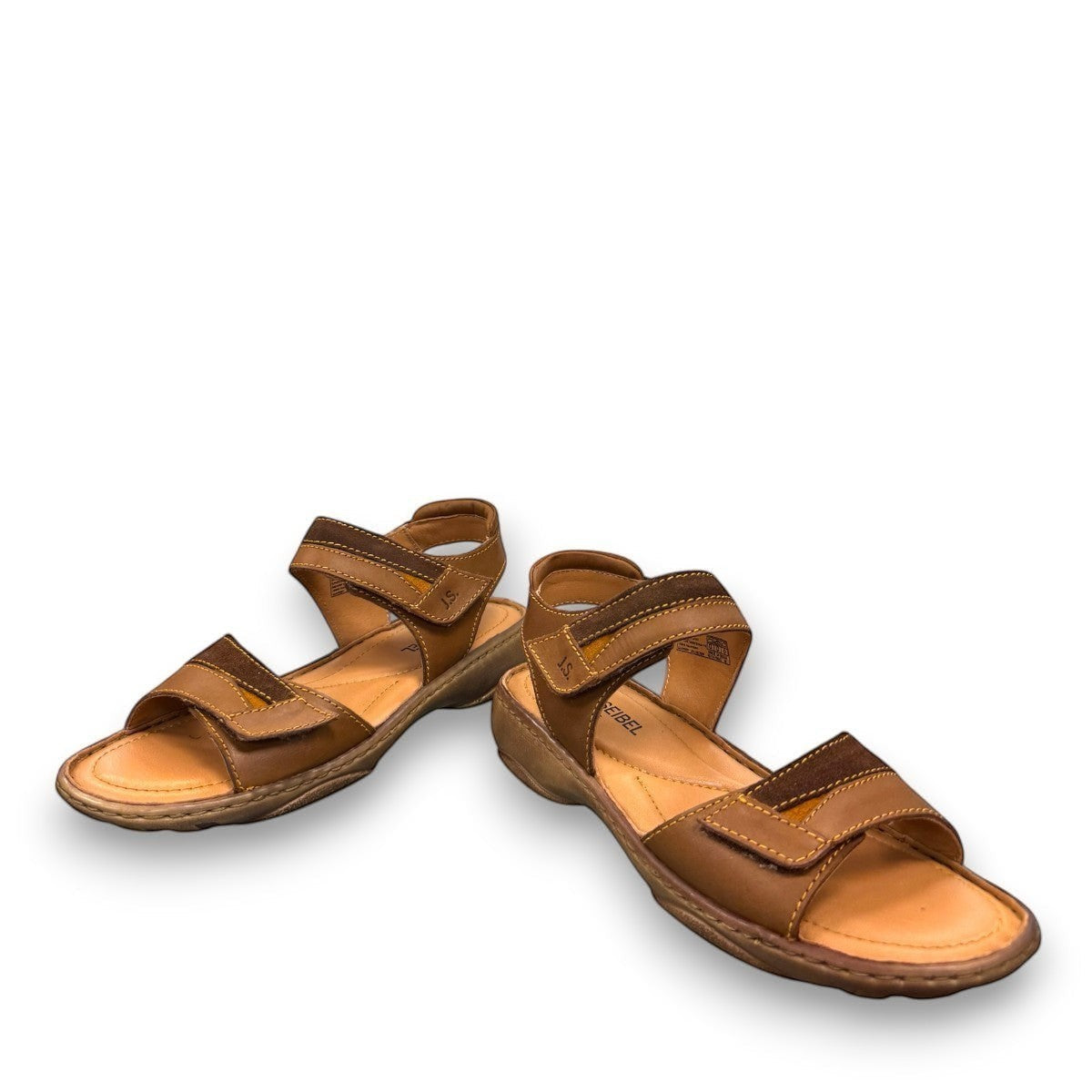 Josef Seibel Debra 019 castagne/kombe brown leather sandals showing the durable handstitched wavy tread soles