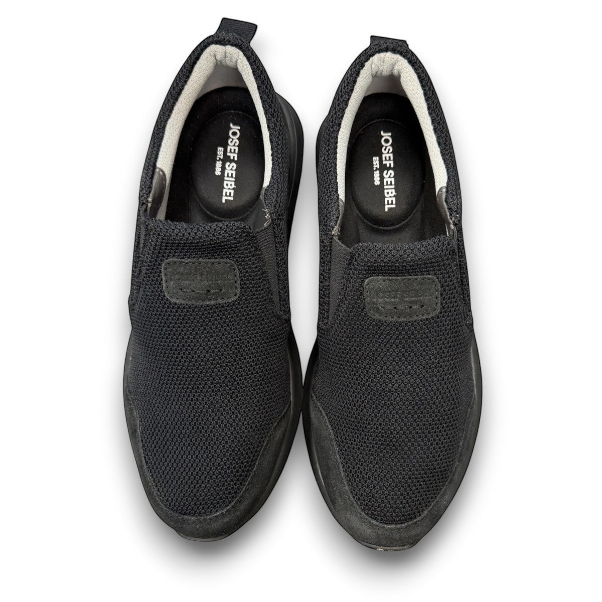 JOSEF SEIBEL Cameron 13 black slip-on shoe with durable cowhide leather and comfortable EVA sole. 
photo of the top.