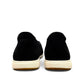 Josef Seibel Caren 67 black leather slip-on shoes showing the flexible brown TR-light patterned soles