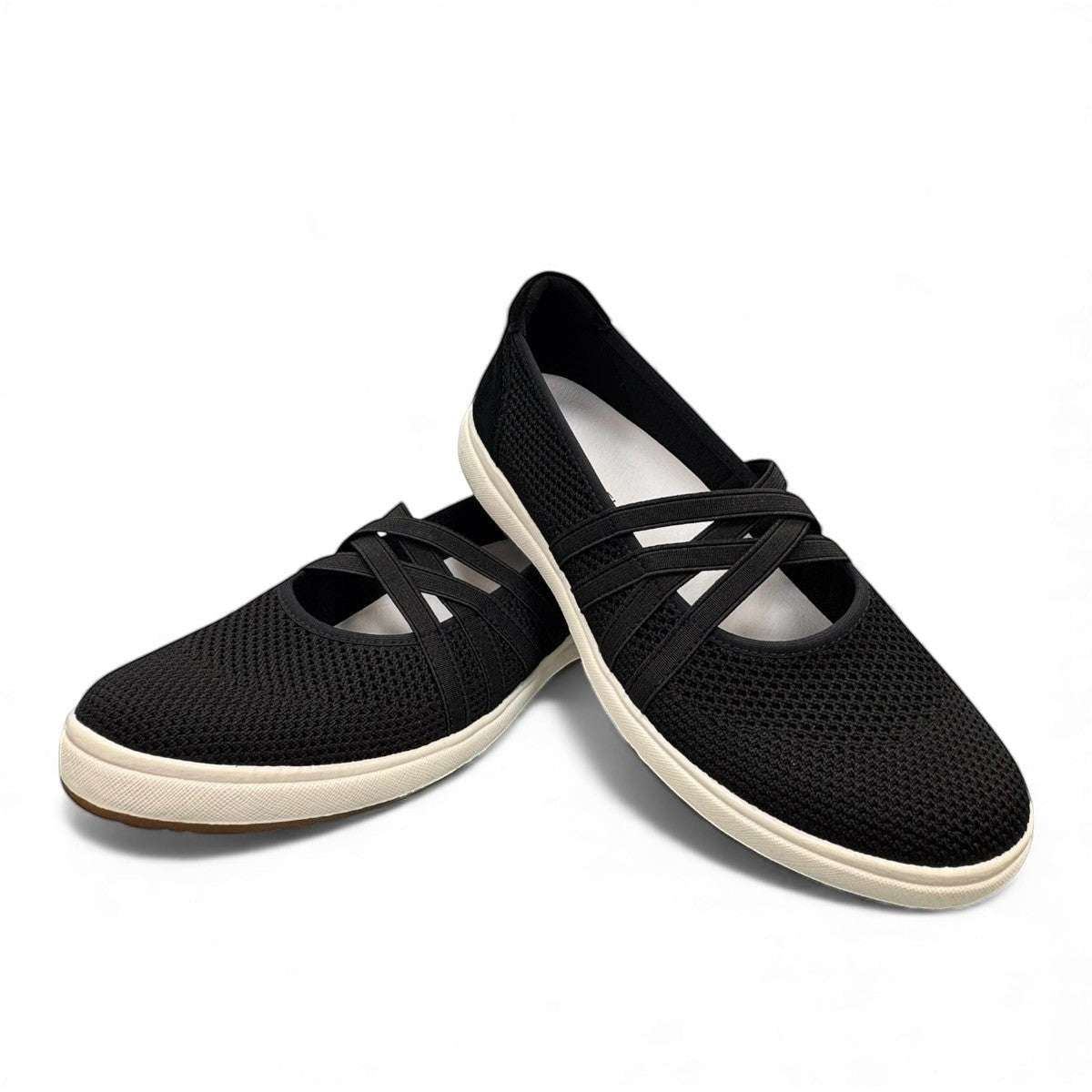 Josef Seibel Caren 67 black leather slip-on shoes showing the flexible brown TR-light patterned soles