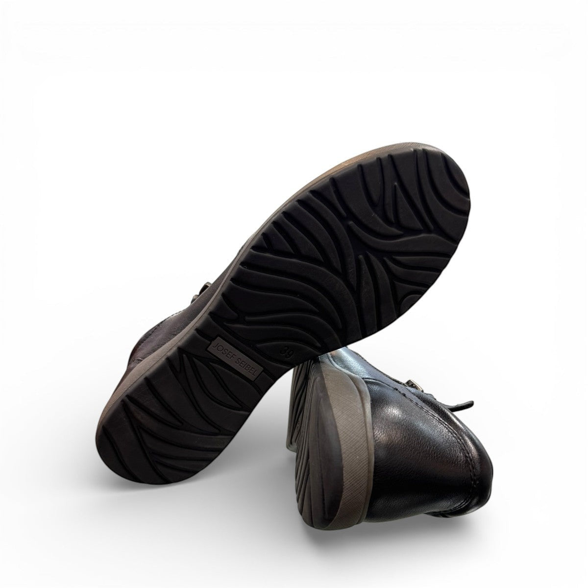 Josef Seibel Caren 23 black leather slip-on shoe with side zipper and comfortable rubber sole. photo of the bottom.
