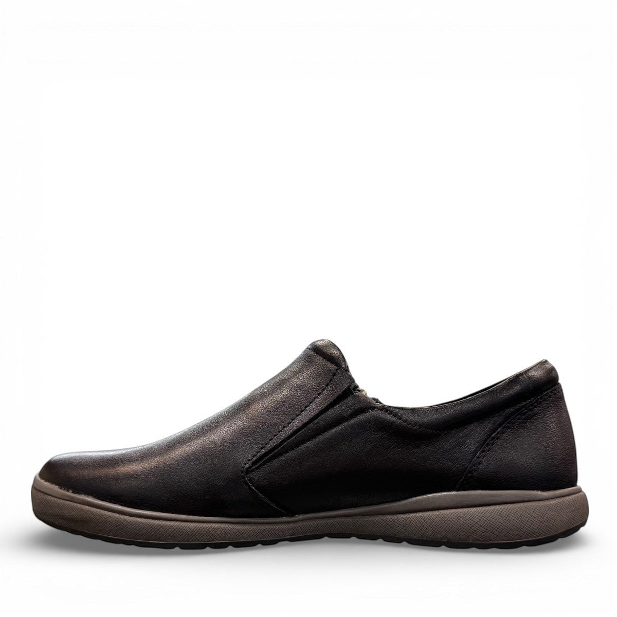 Josef Seibel Caren 23 black leather slip-on shoe with side zipper and comfortable rubber sole. photo of the left side.