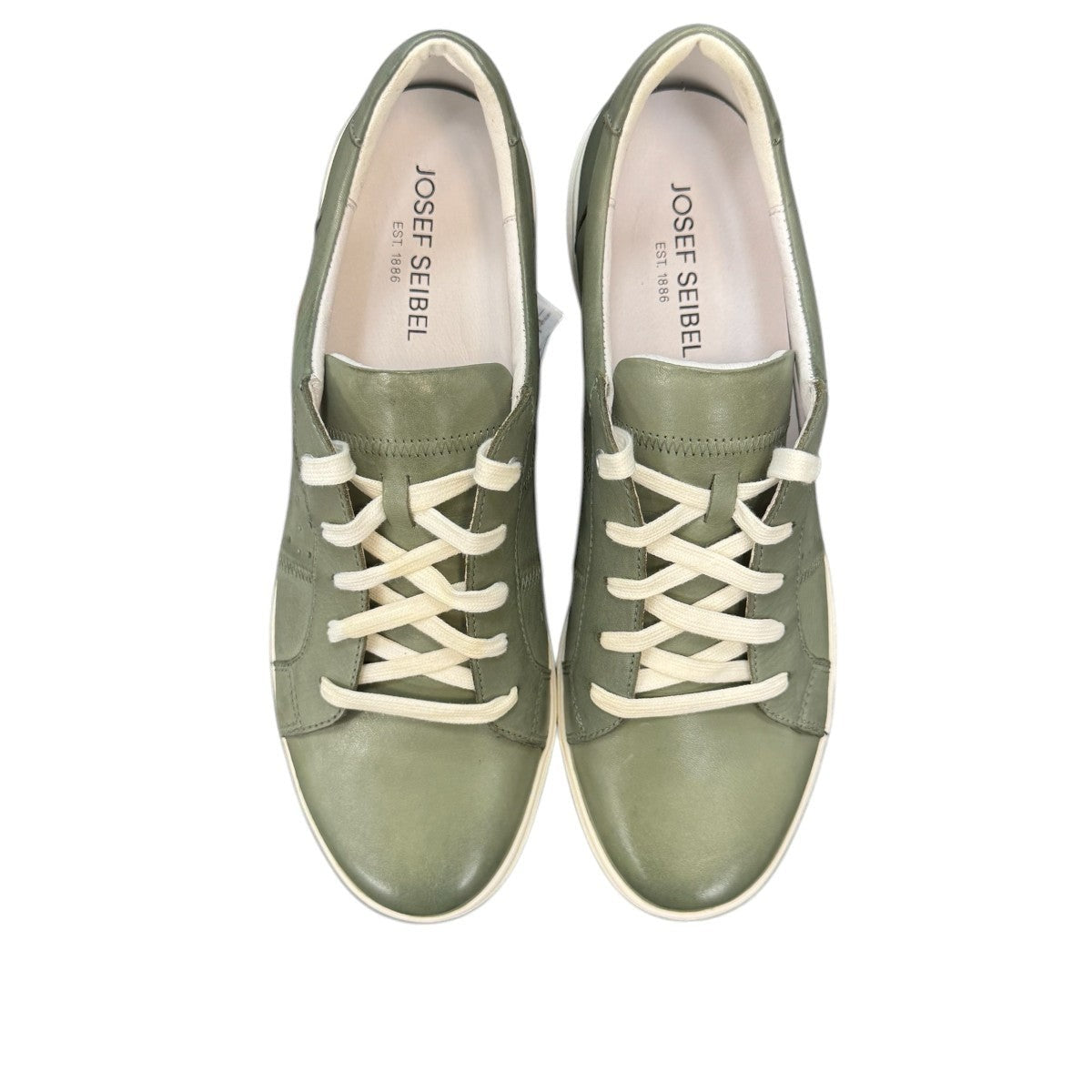 Josef Seibel Caren 01 mint green leather lace-up sneaker with perforated side detail and rubber sole. photo of the top.
