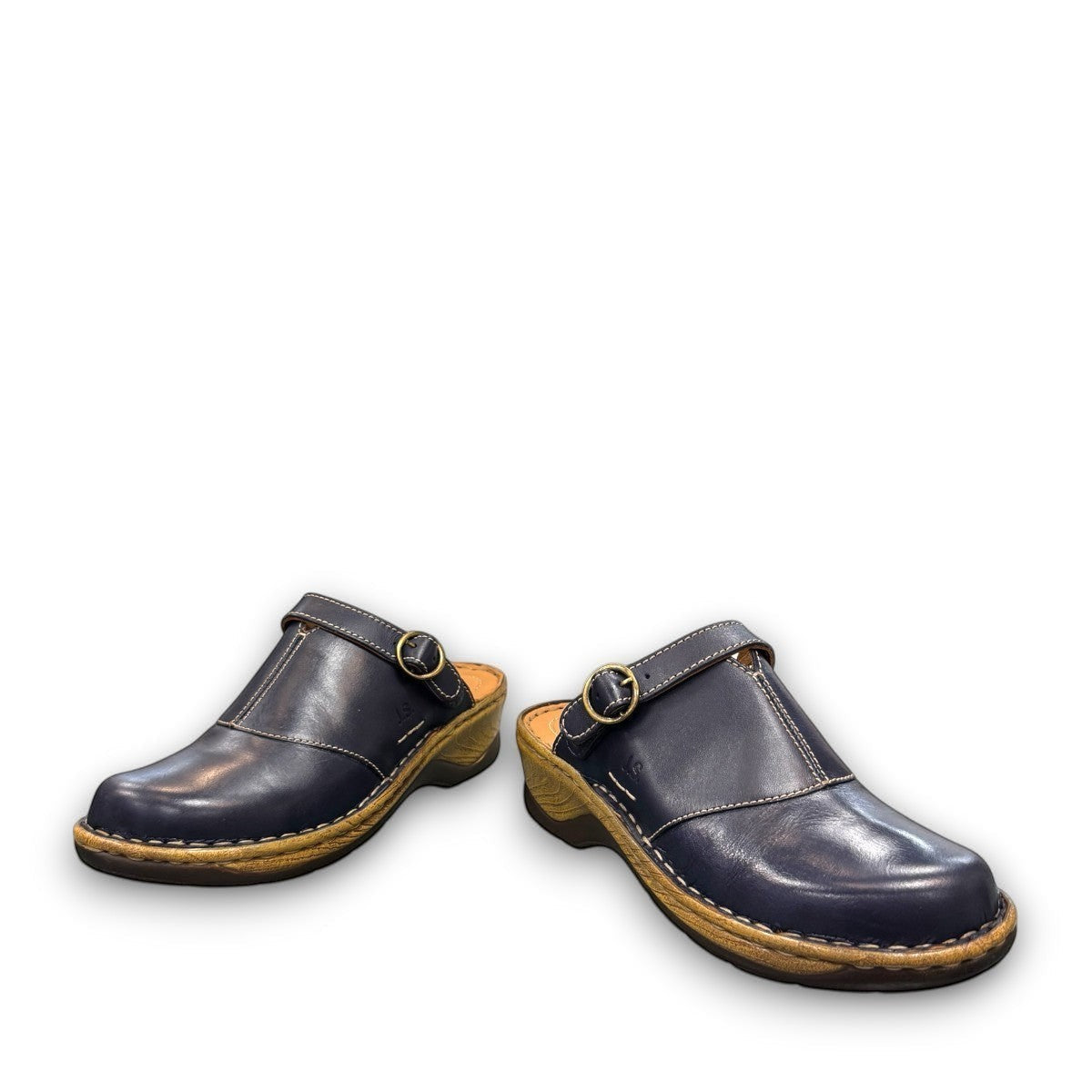 JOSEF SEIBEL Catalonia 83 indigo leather clogs with a decorative buckle and sturdy wood-look PU sole.