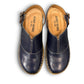 JOSEF SEIBEL Catalonia 83 indigo leather clogs with a decorative buckle and sturdy wood-look PU sole.