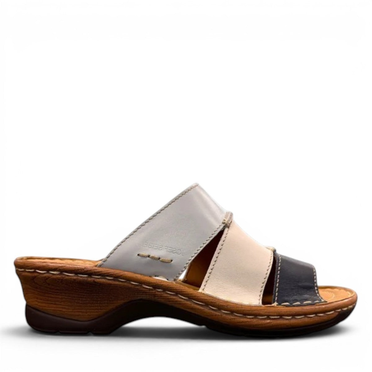 Josef Seibel Catalonia 86 wedge sandals in ocean blue and white leather with a slip-on design. 
photo of the right side.