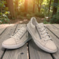 Josef Seibel Claire 03 white leather sneakers with side zip and lace-up closure on a rubber sole. photo of the front.