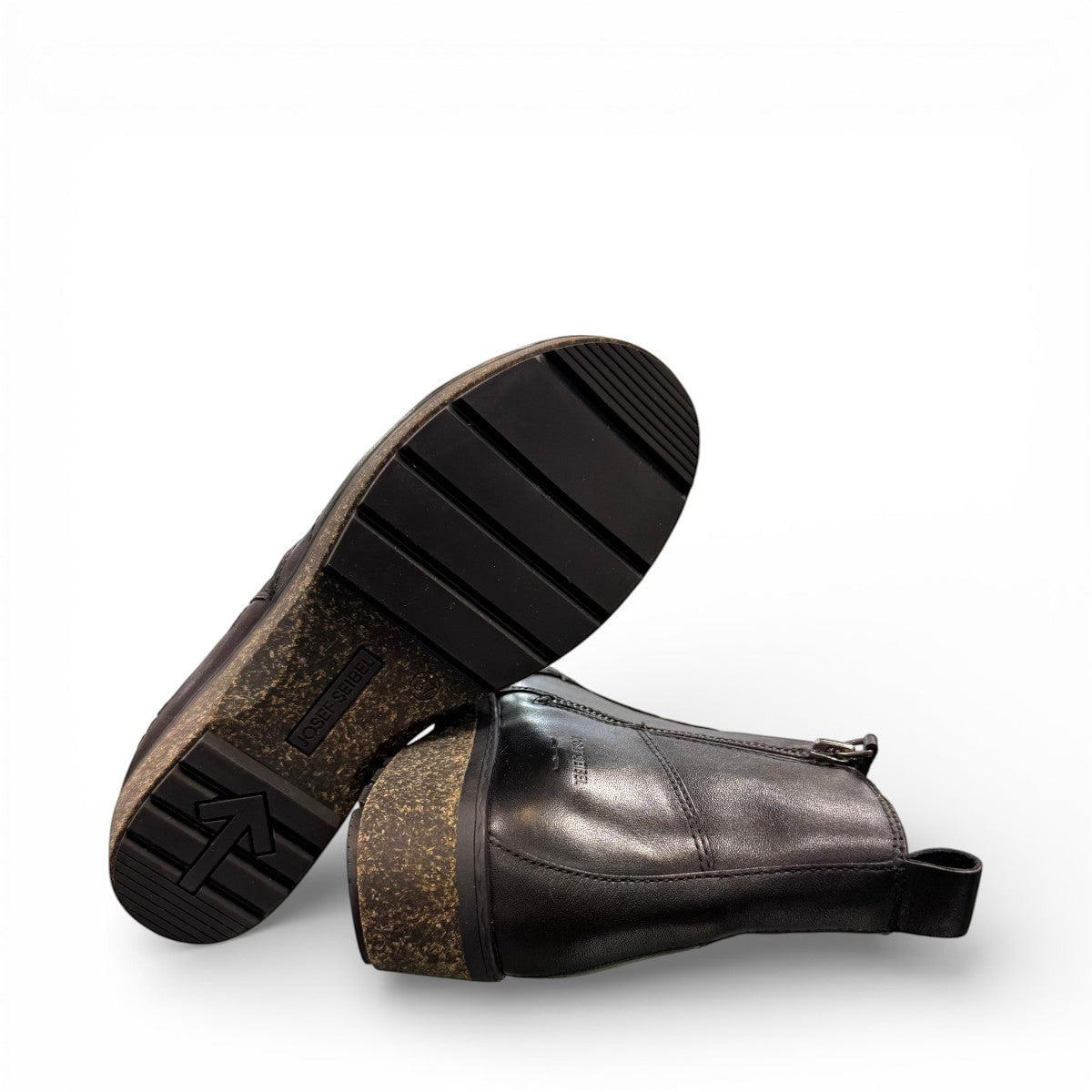 Sina Footwear Josef Seibel Darla 02 black leather ankle boots with side zipper and textured cork wedge sole. photo of the bottom.