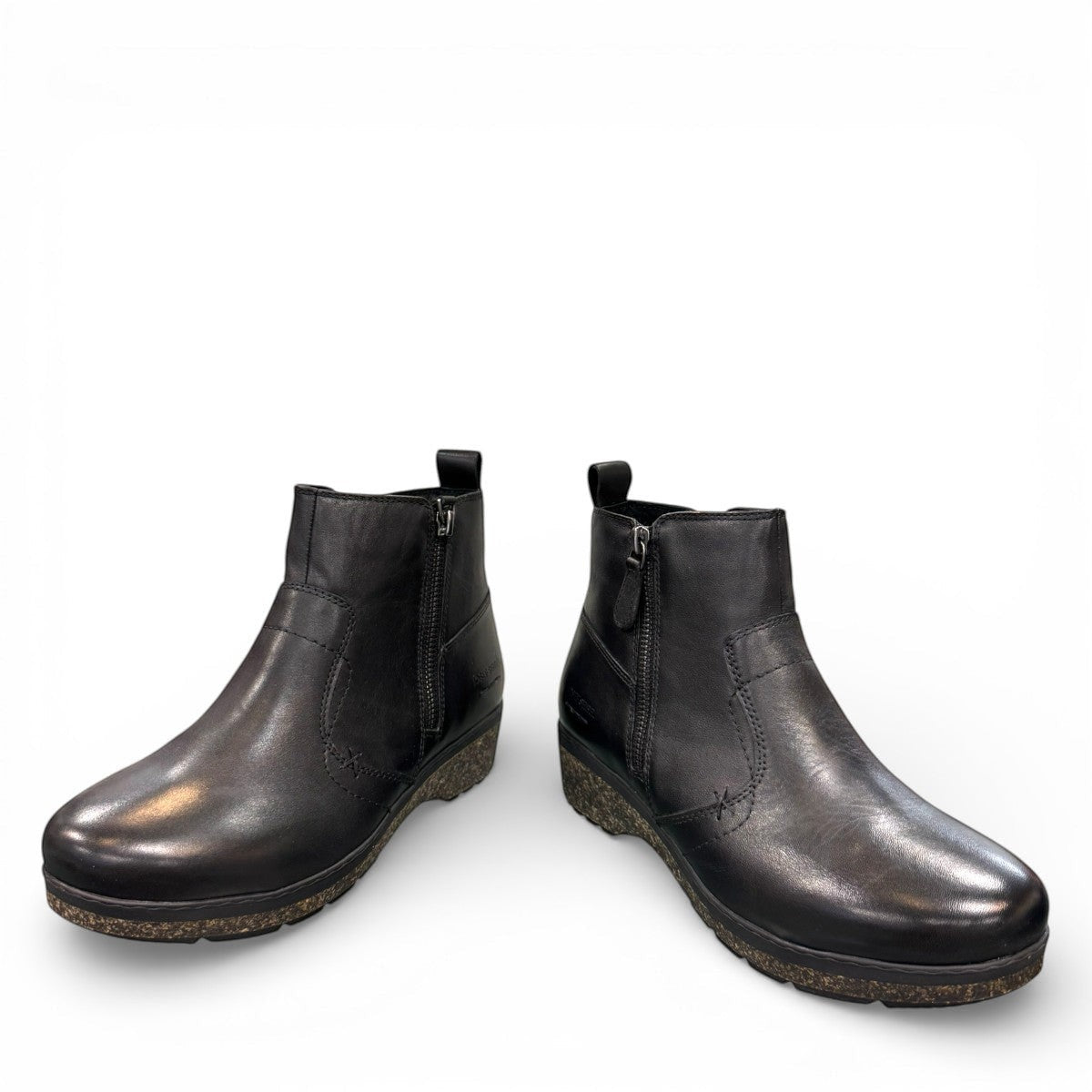Sina Footwear Josef Seibel Darla 02 black leather ankle boots with side zipper and textured cork wedge sole.
photo of the front.