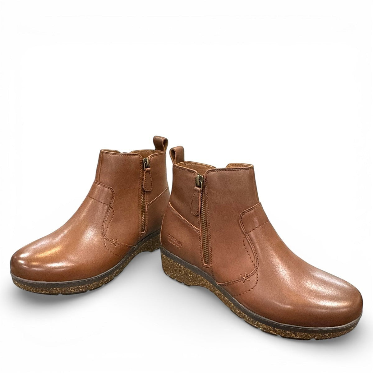 Josef Seibel Darla 02 brown leather ankle boots with side zipper and cork-textured wedge sole. photo of the front.