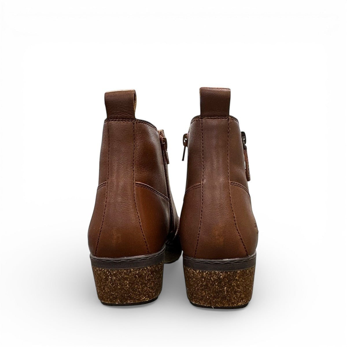 Josef Seibel Darla 02 brown leather ankle boots with side zipper and cork-textured wedge sole. photo of the back.