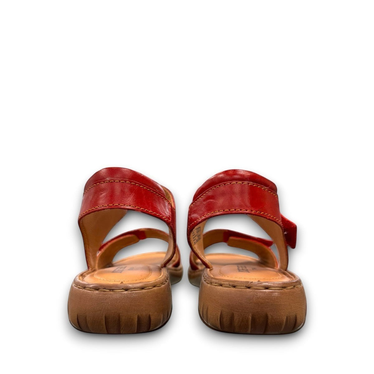 Josef Seibel Debra red leather sandals showing the durable handstitched brown textured outsoles