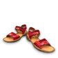 Josef Seibel Debra red leather sandals showing the durable handstitched brown textured outsoles