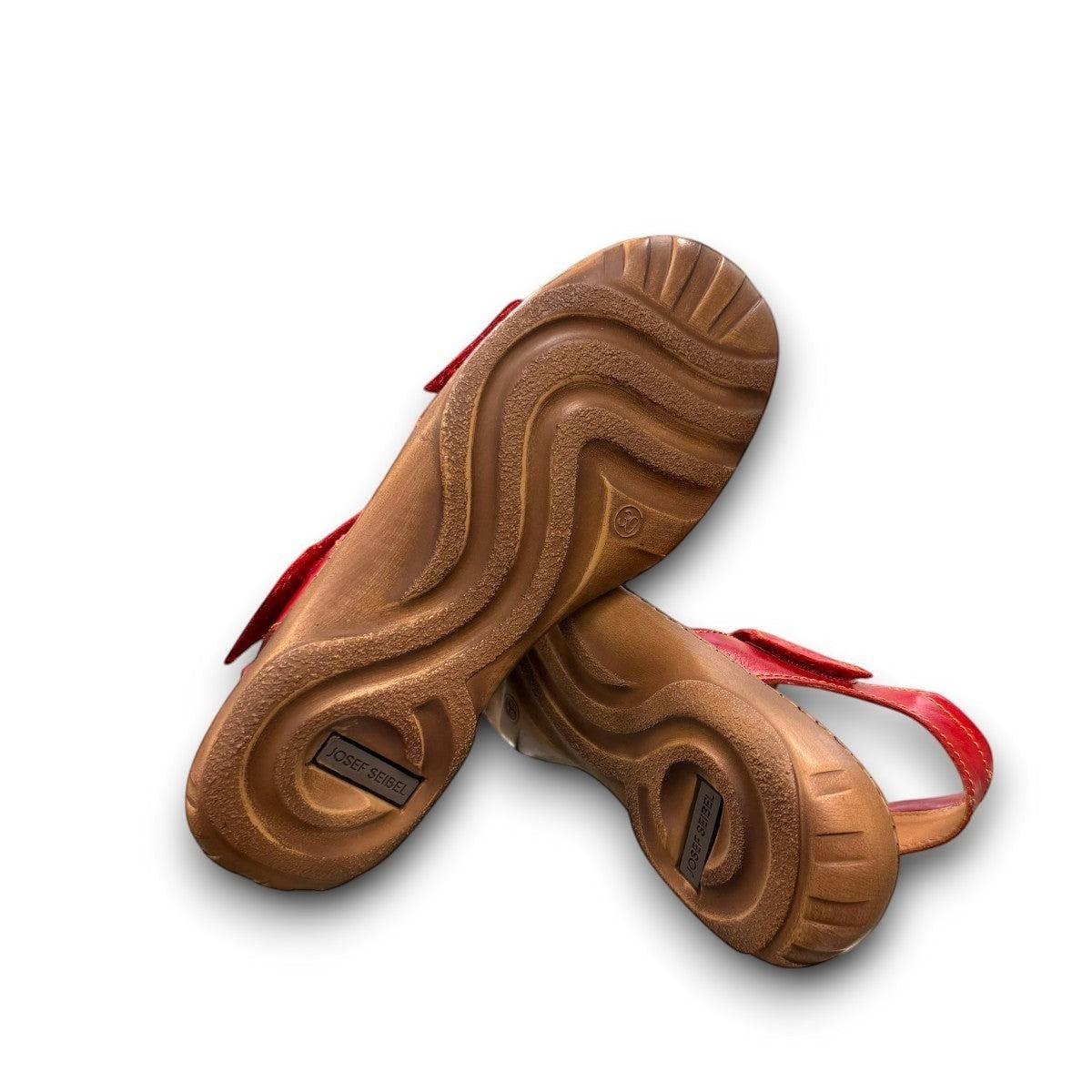 Josef Seibel Debra red leather sandals showing the durable handstitched brown textured outsoles